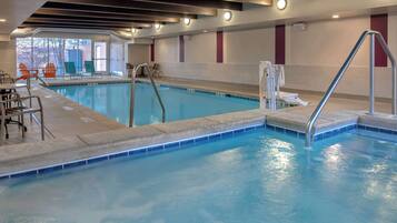 Indoor pool, open 6 AM to midnight, pool loungers