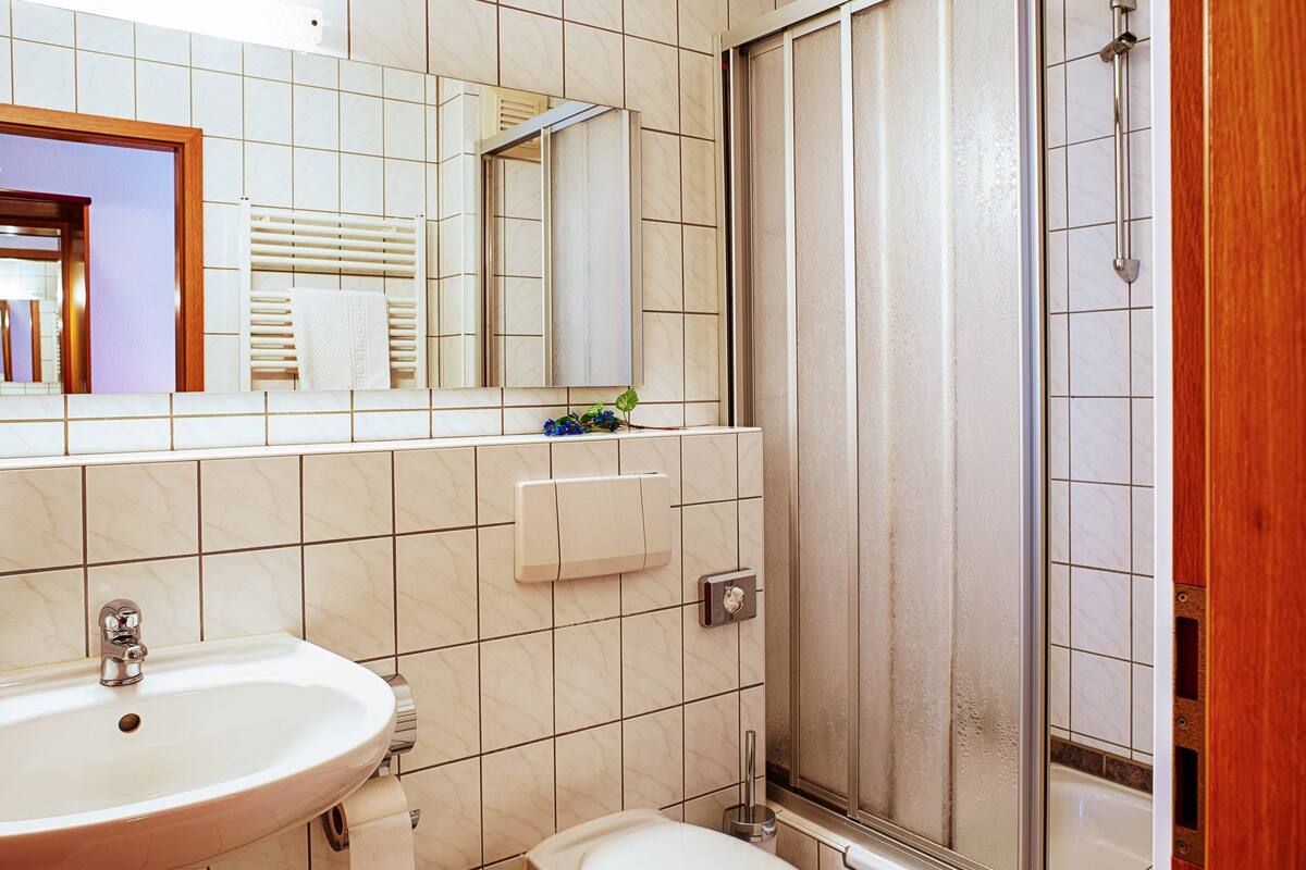 studio, 1 queen bed | bathroom | shower, hair dryer, towels