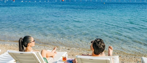 Private beach, sun loungers, beach umbrellas