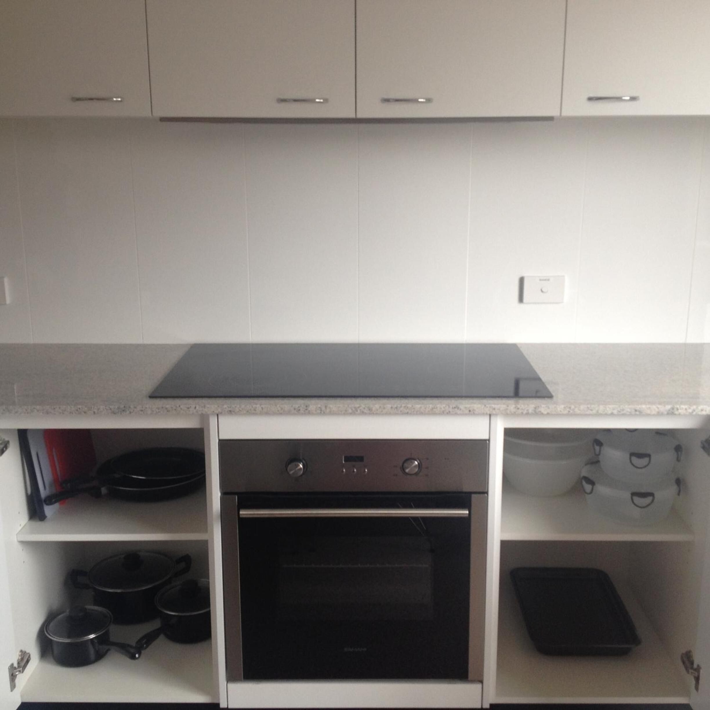 mini-fridge, microwave, electric kettle, cookware/dishes/utensils