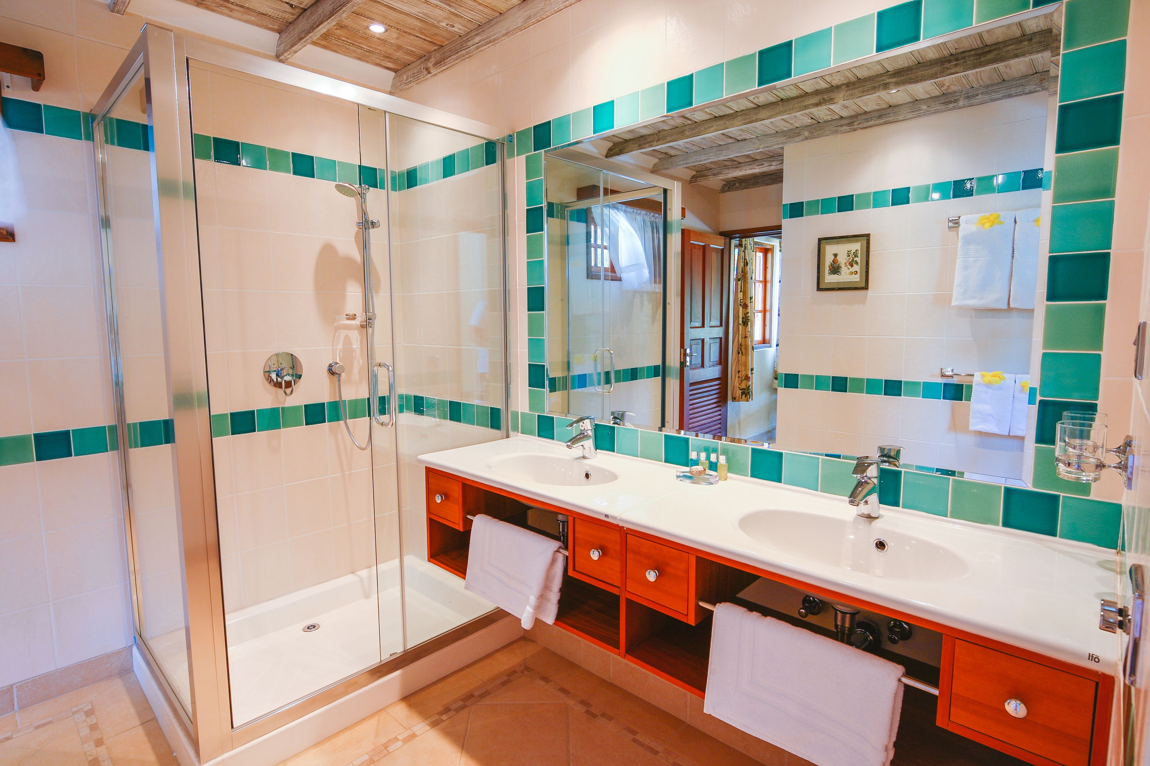 designer toiletries, hair dryer, bathrobes, towels