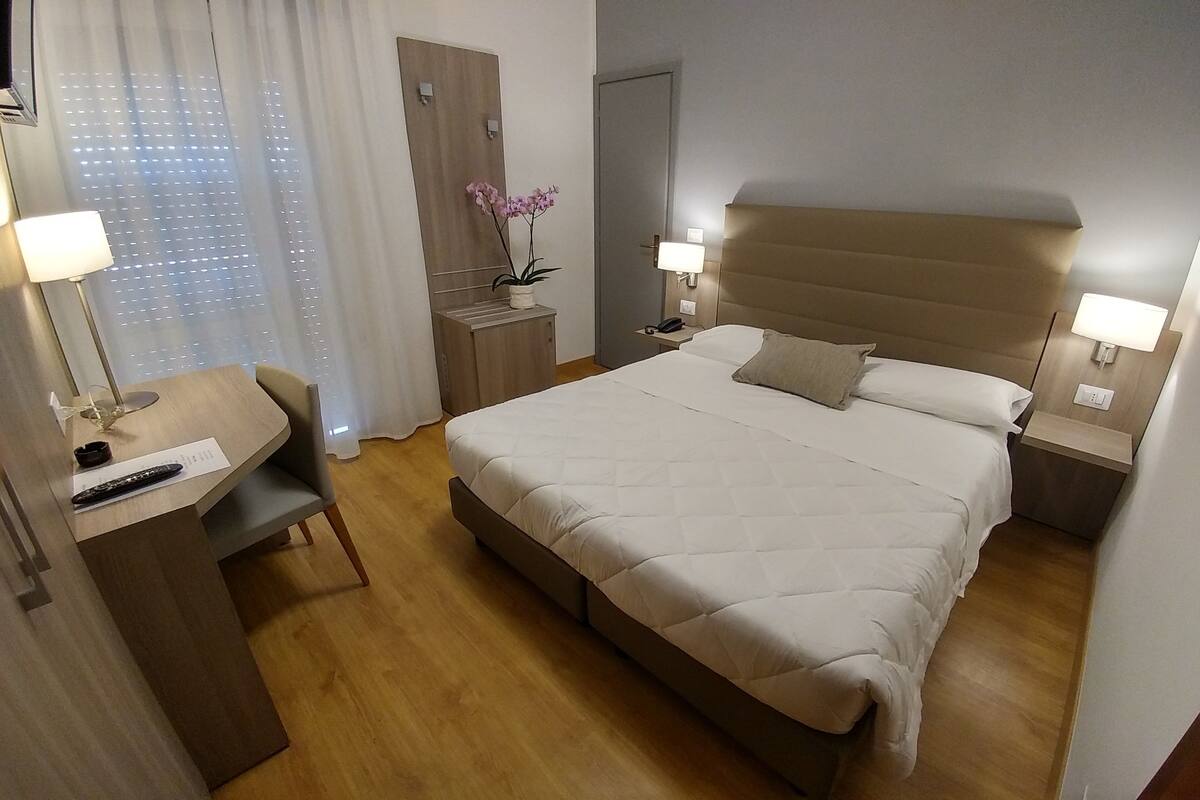 Comfort Double Room, Partial Sea View | In-room safe, desk, free WiFi, bed sheets