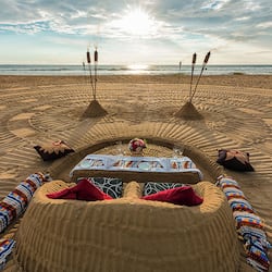 On the beach, beach towels, waterskiing, windsurfing