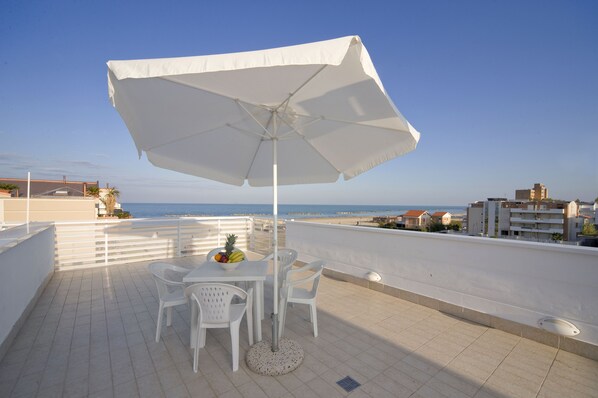 Familie penthouse | Uitzicht op strand/zee