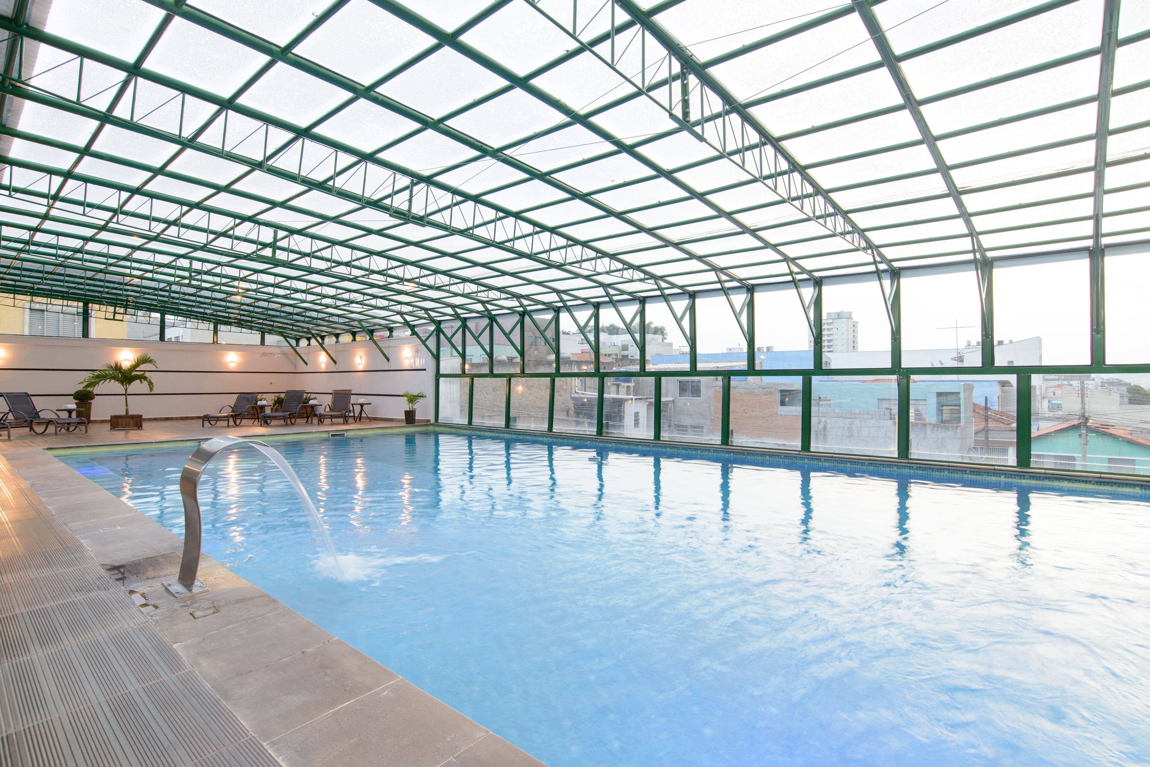 2 outdoor pools, pool umbrellas, pool loungers