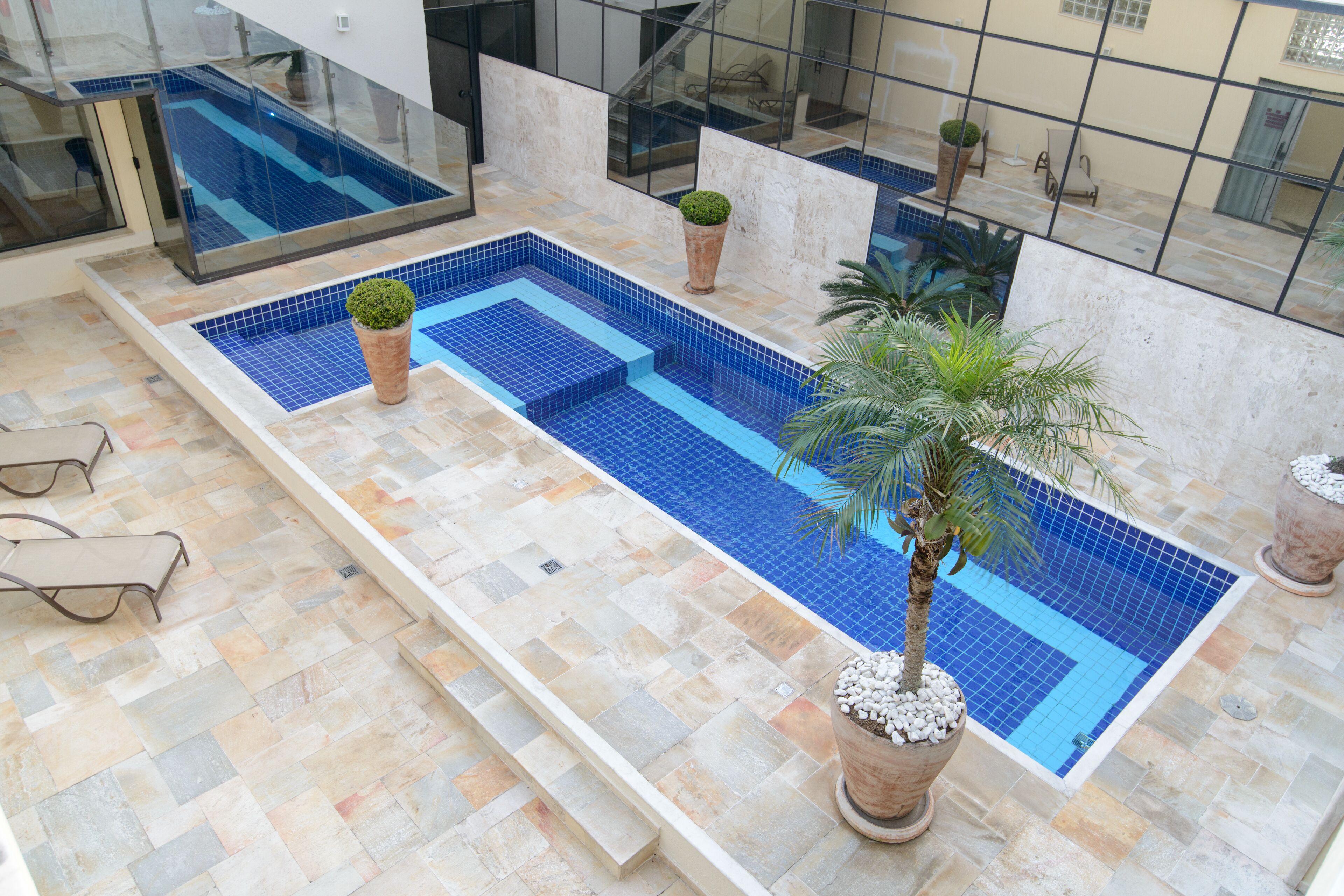 2 outdoor pools, pool umbrellas, pool loungers