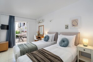 Twin Room with Garden View | Sábanas de algodón egipcio, ropa de cama de alta calidad, caja fuerte