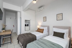Twin Room with Garden View | Egyptian cotton sheets, premium bedding, in-room safe, desk - Hotel Flisvos (Sitia)