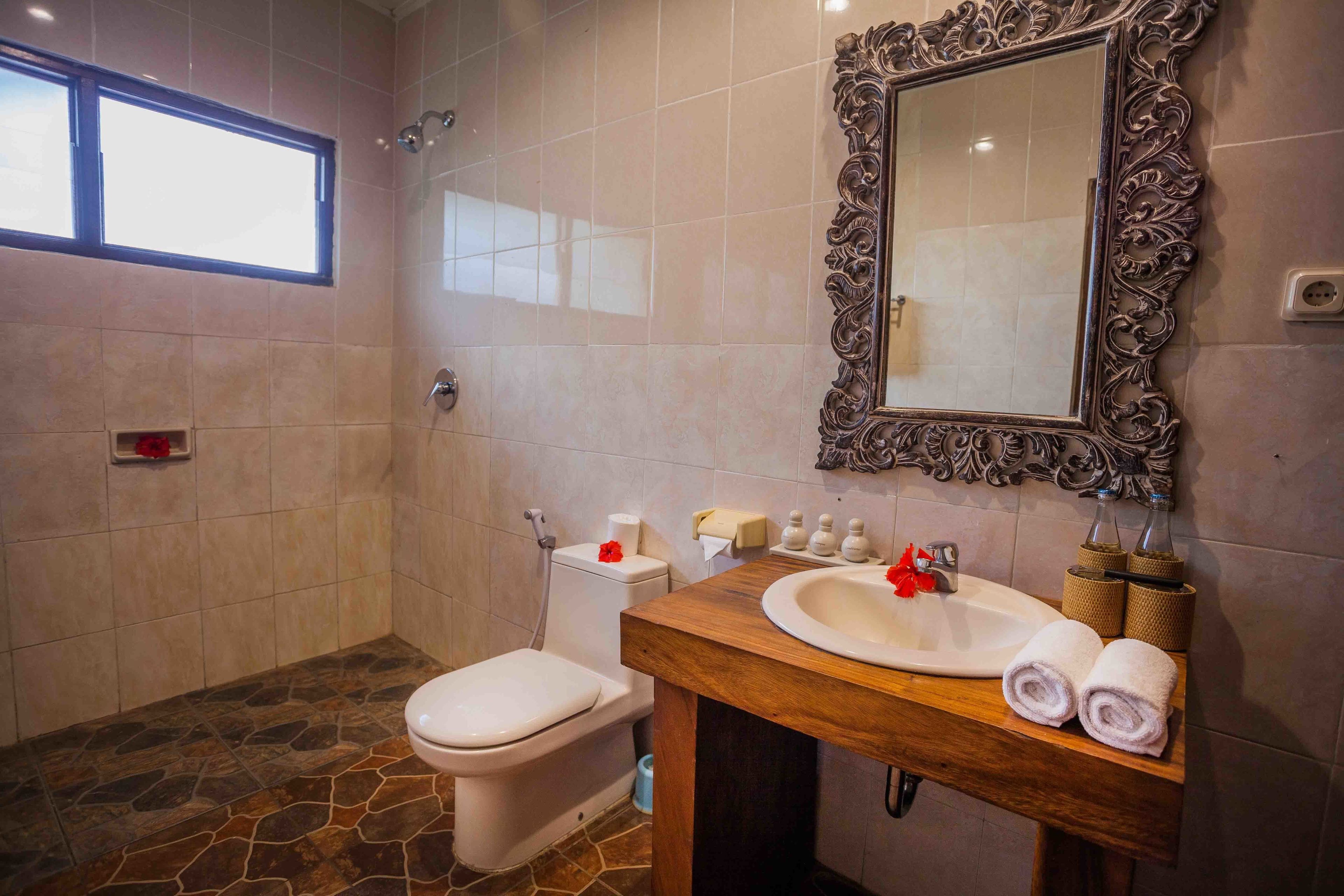 standard room | bathroom | shower, free toiletries, hair dryer, slippers