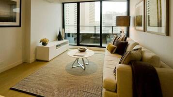 Two Bedroom Two Bathroom Apartment | Living area | 32-inch LCD TV with cable channels, TV, DVD player