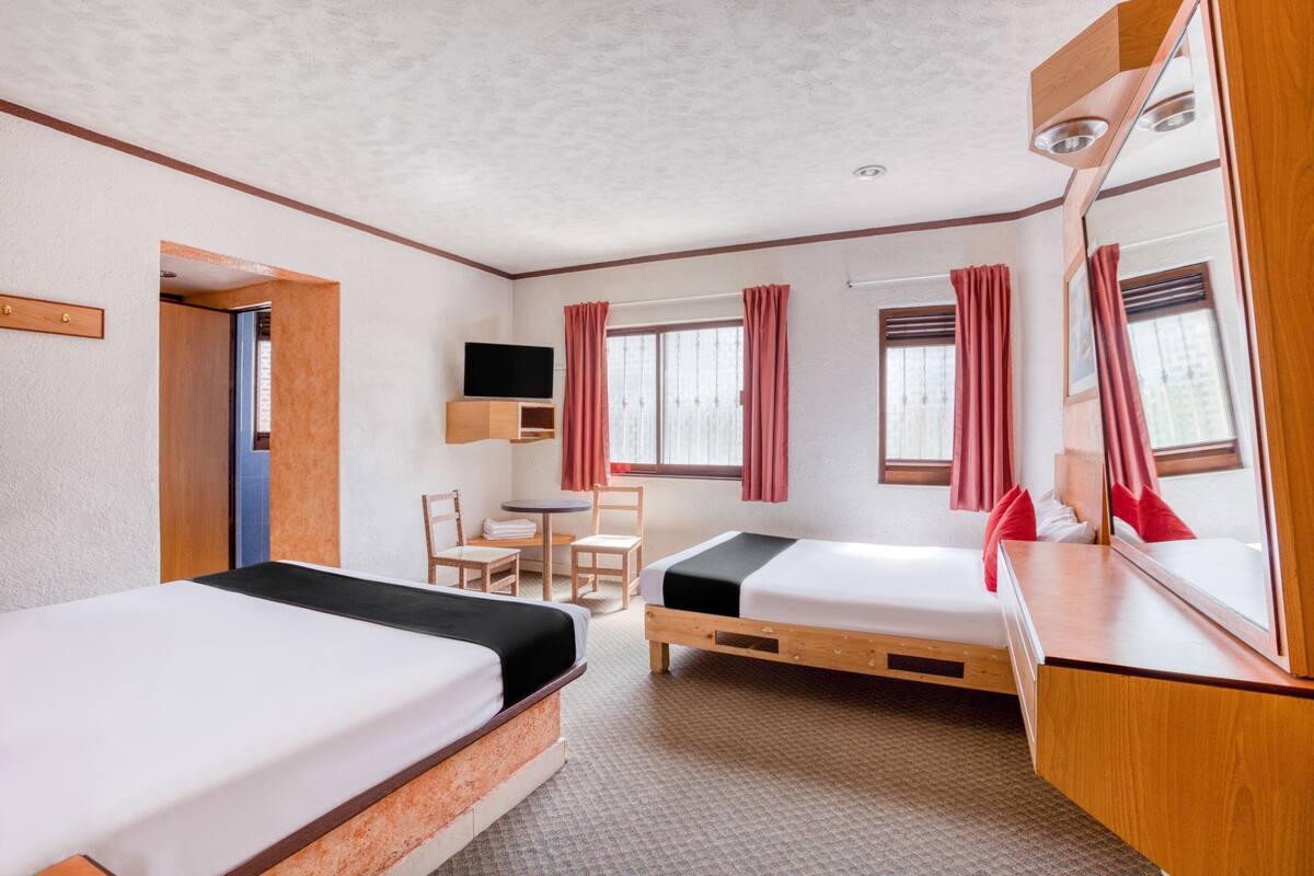 Standard Room, 2 Queen Beds | WiFi (free), bed sheets