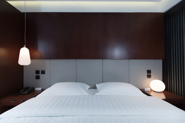 Chambre « Premier » | Literie de qualité supérieure, minibar, coffres-forts dans les chambres