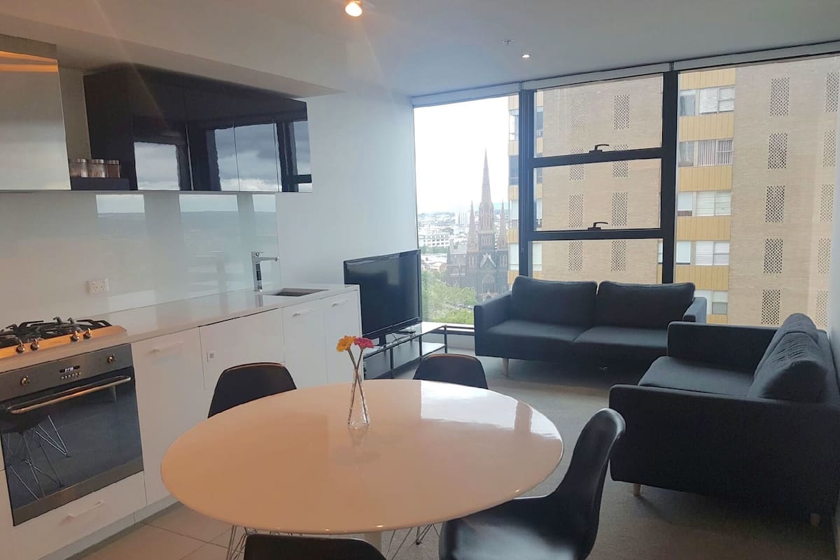 Two Bedroom Family Apartment | Living area | 32-inch LCD TV with cable channels, TV, DVD player