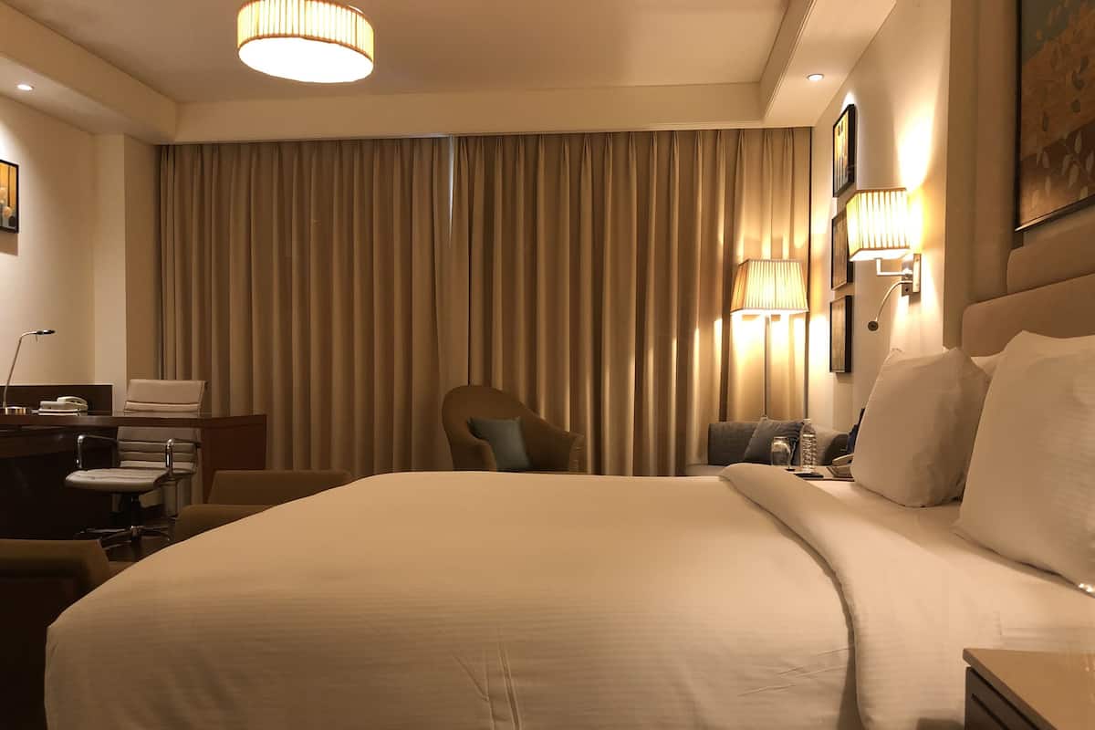 Deluxe Room, 1 King Bed, Pool View | Premium bedding, minibar, in-room safe, desk