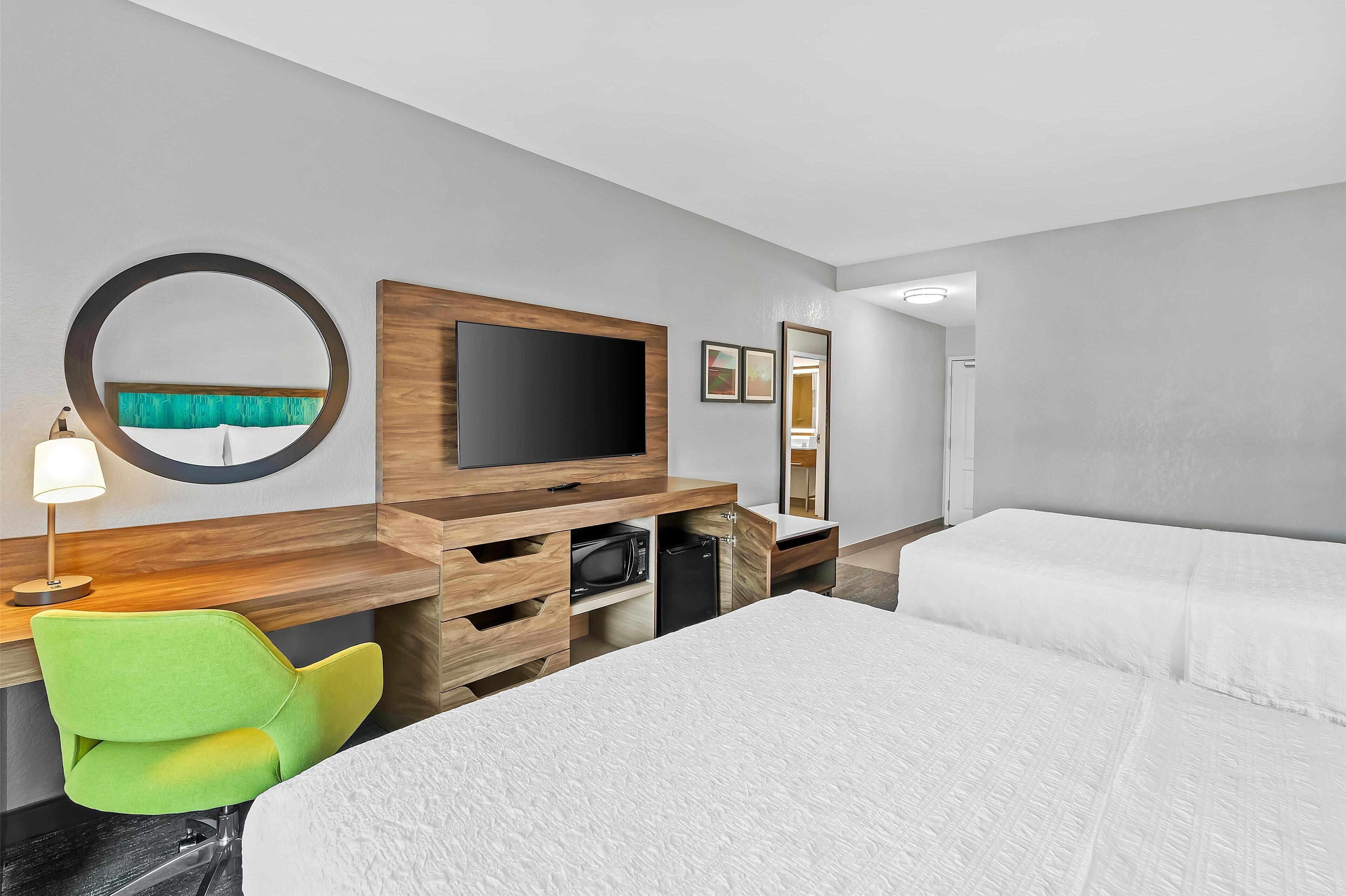 room, 2 queen beds, refrigerator & microwave | in-room safe, desk, blackout curtains, iron/ironing board