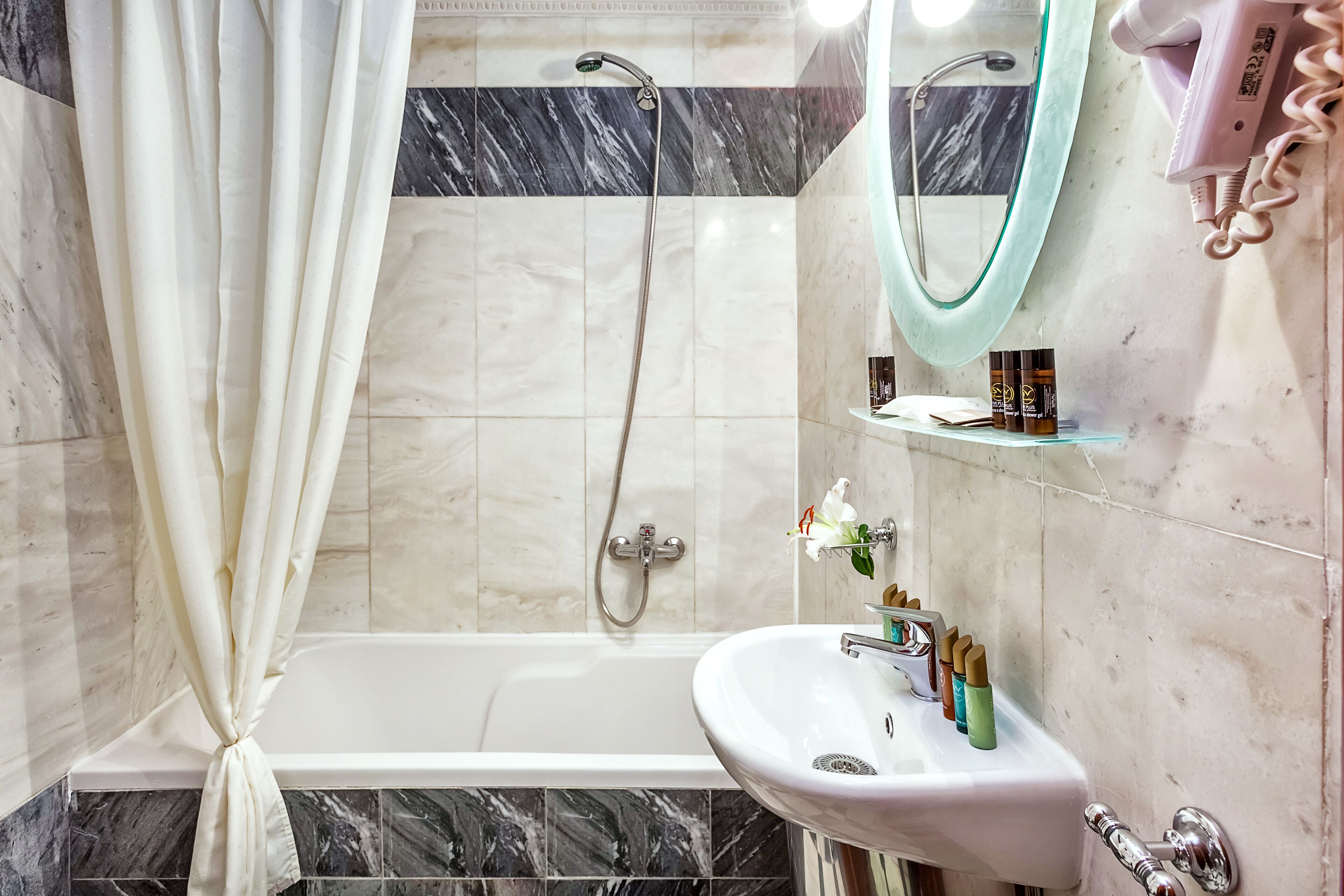 free toiletries, hair dryer, slippers, towels