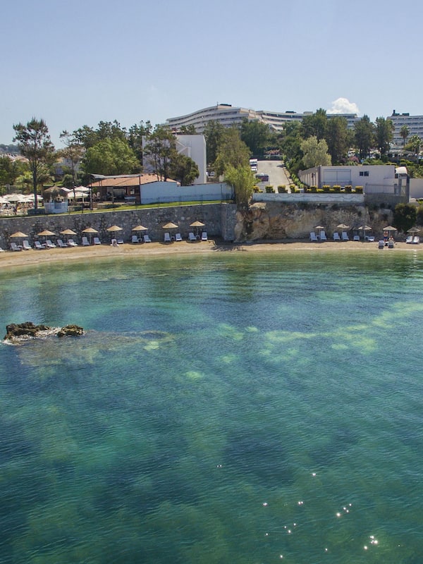 Private beach, sun loungers, beach umbrellas, beach volleyball