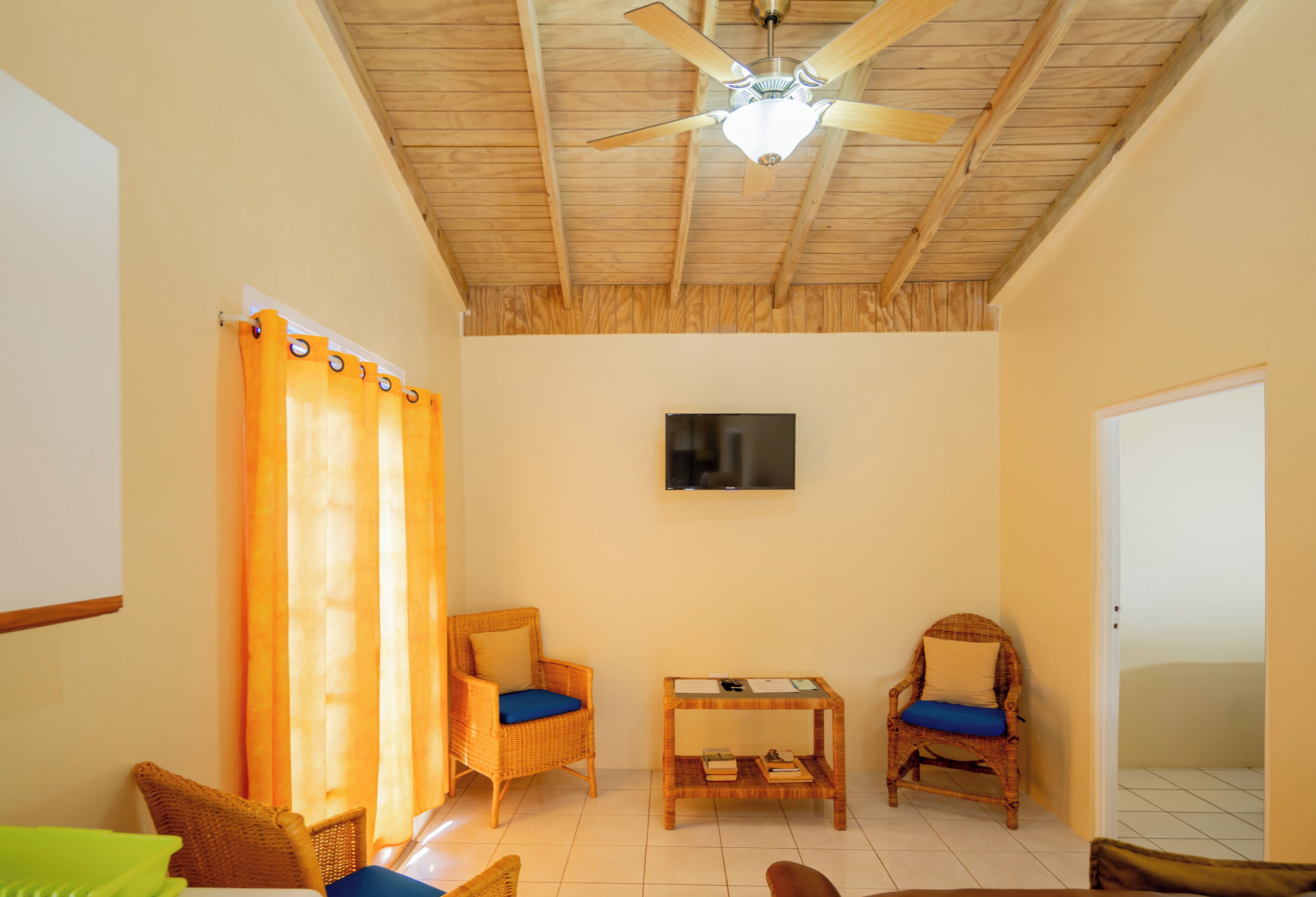 2 bedroom hibiscus villa, garden view, 3 people | living room | 32-inch smart tv with cable channels
