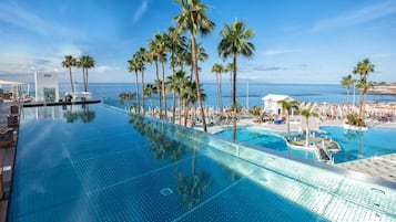 3 outdoor pools, pool umbrellas, sun loungers