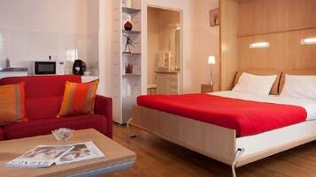Premium bedding, minibar, desk, laptop workspace