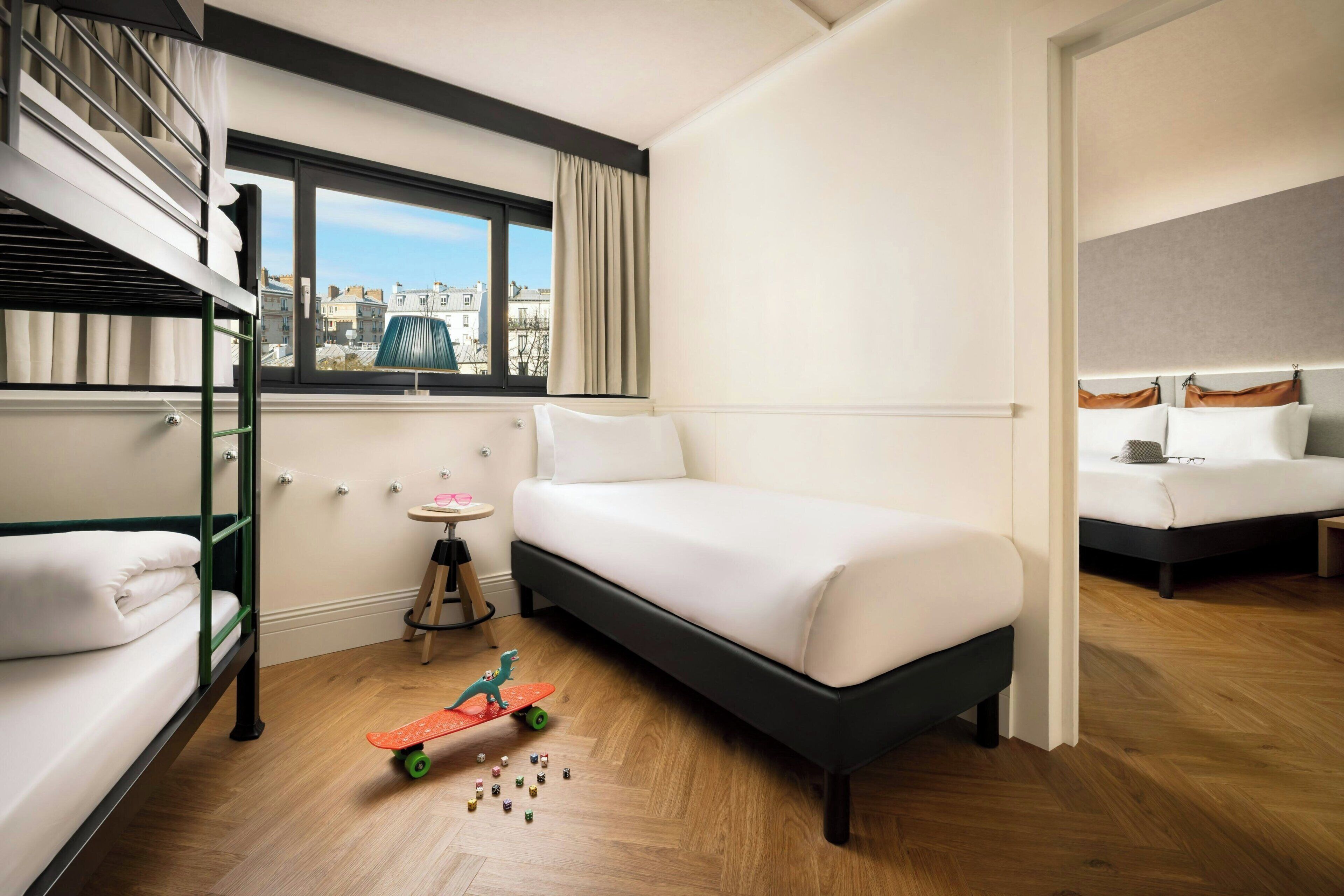 Family Room, 1 Queen Bed | Blackout drapes, iron/ironing board, free WiFi, bed sheets