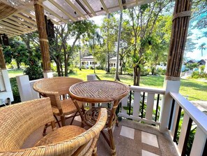 Deluxe Cottage, 1 Bedroom, Garden View | Free minibar items, in-room safe, desk, laptop workspace