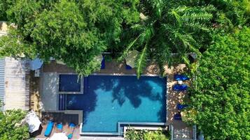 Outdoor pool, open 7:00 AM to 9:00 PM, pool umbrellas, pool loungers