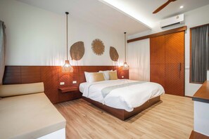 Deluxe Cottage, 1 Bedroom, Garden View | Free minibar items, in-room safe, desk, laptop workspace