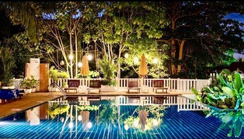 Outdoor pool, open 7:00 AM to 9:00 PM, pool umbrellas, pool loungers