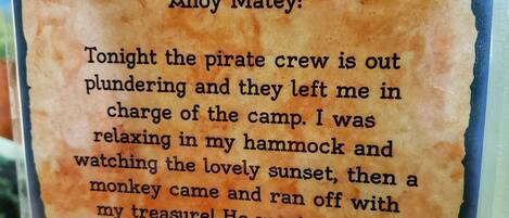 A framed text with a pirate-themed message.