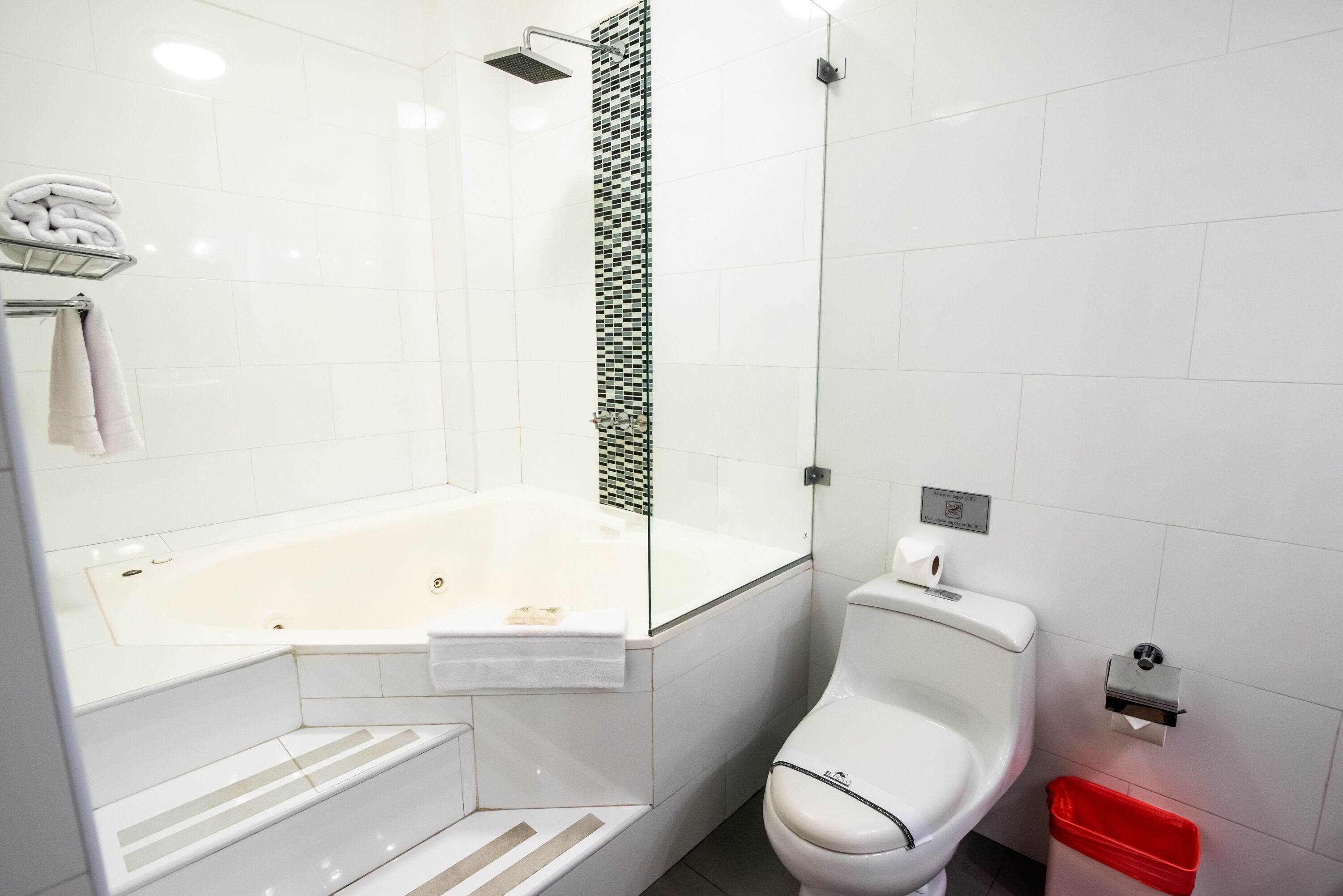 deluxe suite, 1 king bed | bathroom | free toiletries, hair dryer, bidet, towels