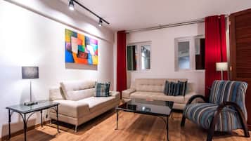 Suite sénior, 2 camas dobles | Ropa de cama de alta calidad, edredones de plumas, minibar y caja fuerte