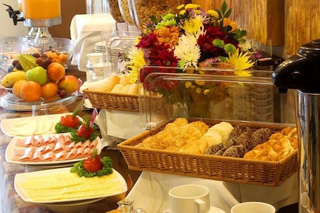 Daily buffet breakfast (USD 14 per person)