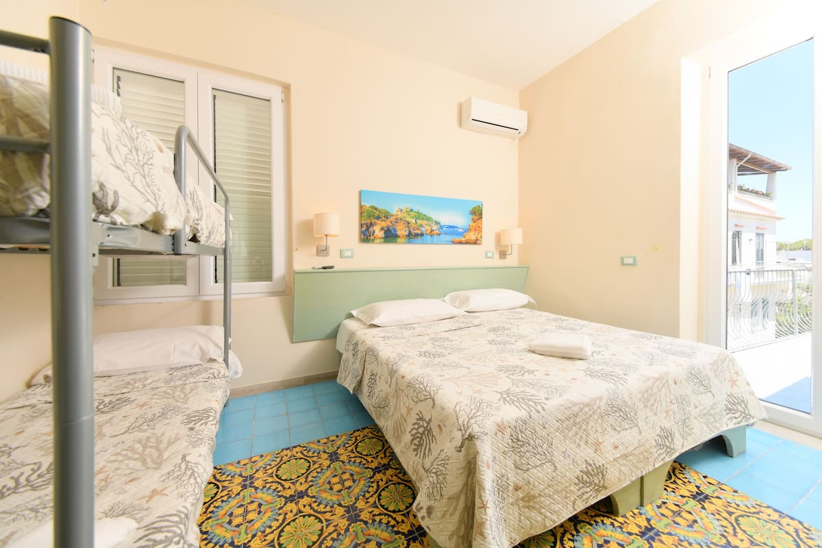 Quadruple Room | Minibar, desk, laptop workspace, free WiFi