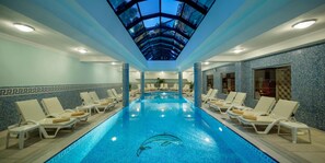 Indoor pool, seasonal outdoor pool, free pool cabanas, pool umbrellas