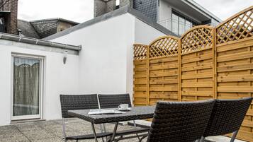 Executive appartement, 1 slaapkamer | Terras