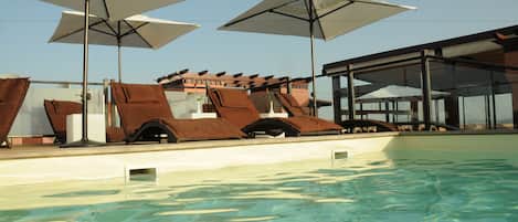 Outdoor pool, sun loungers