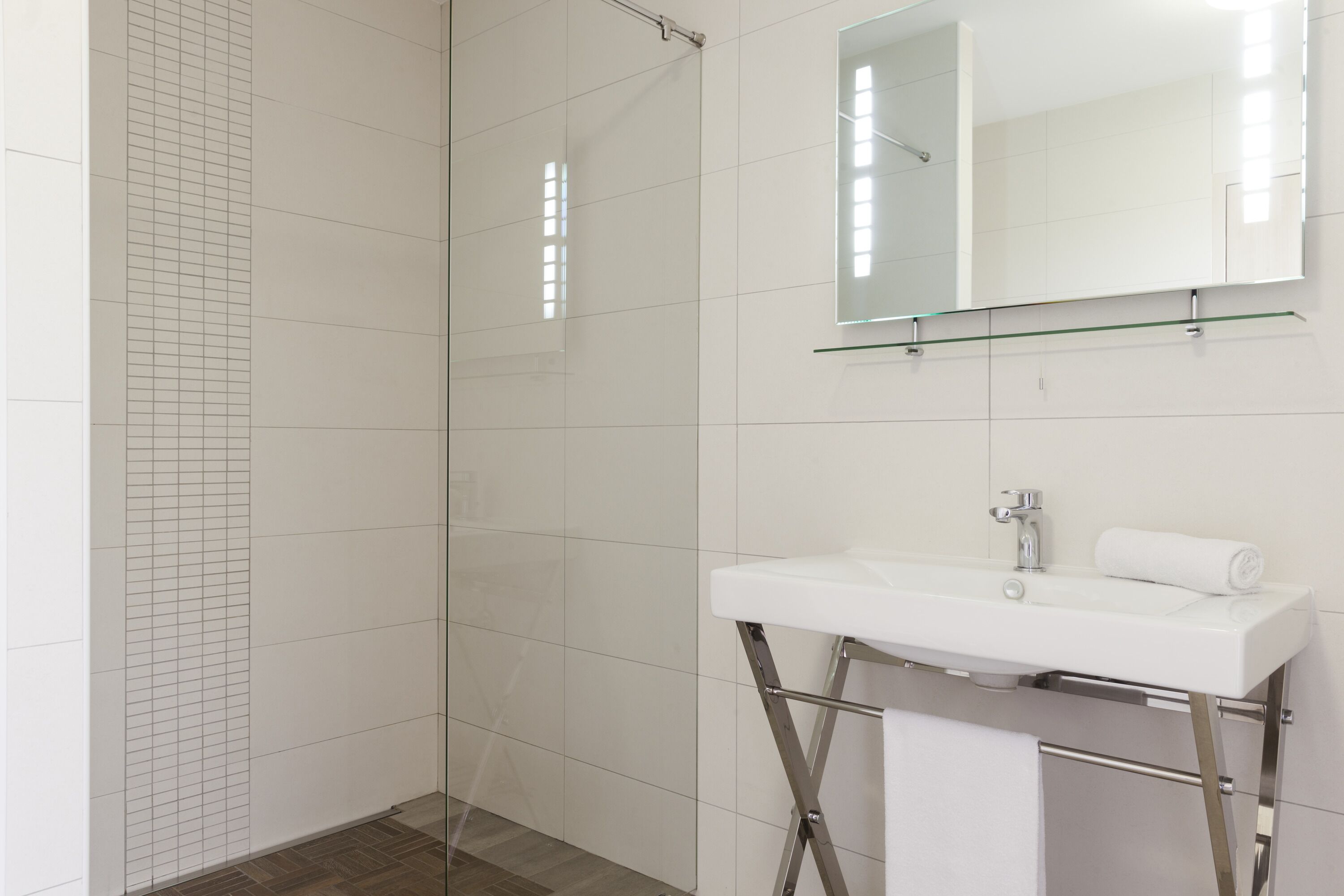 superior twin room | bathroom | shower, hair dryer, towels, soap