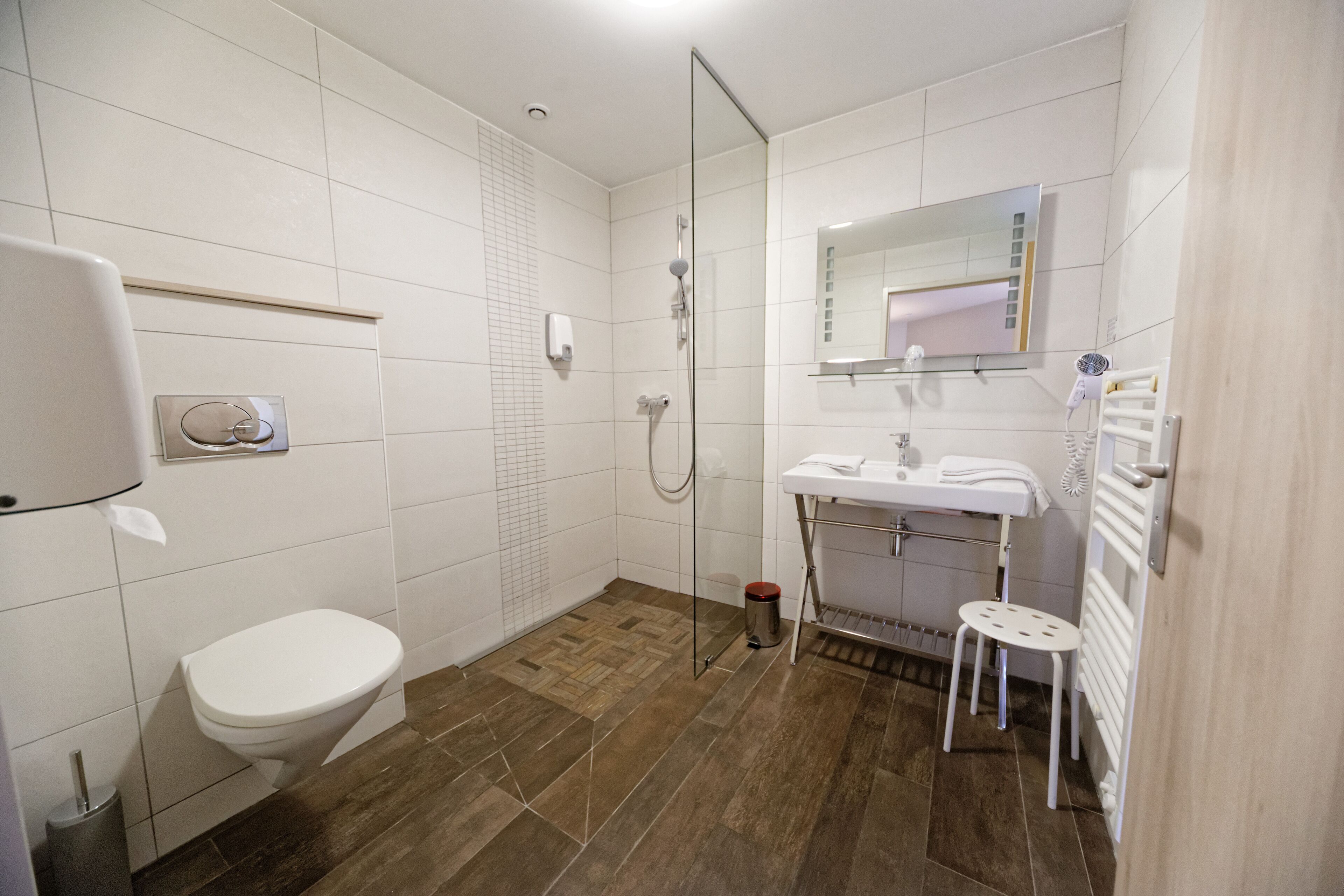 superior double room | bathroom | shower, hair dryer, towels, soap