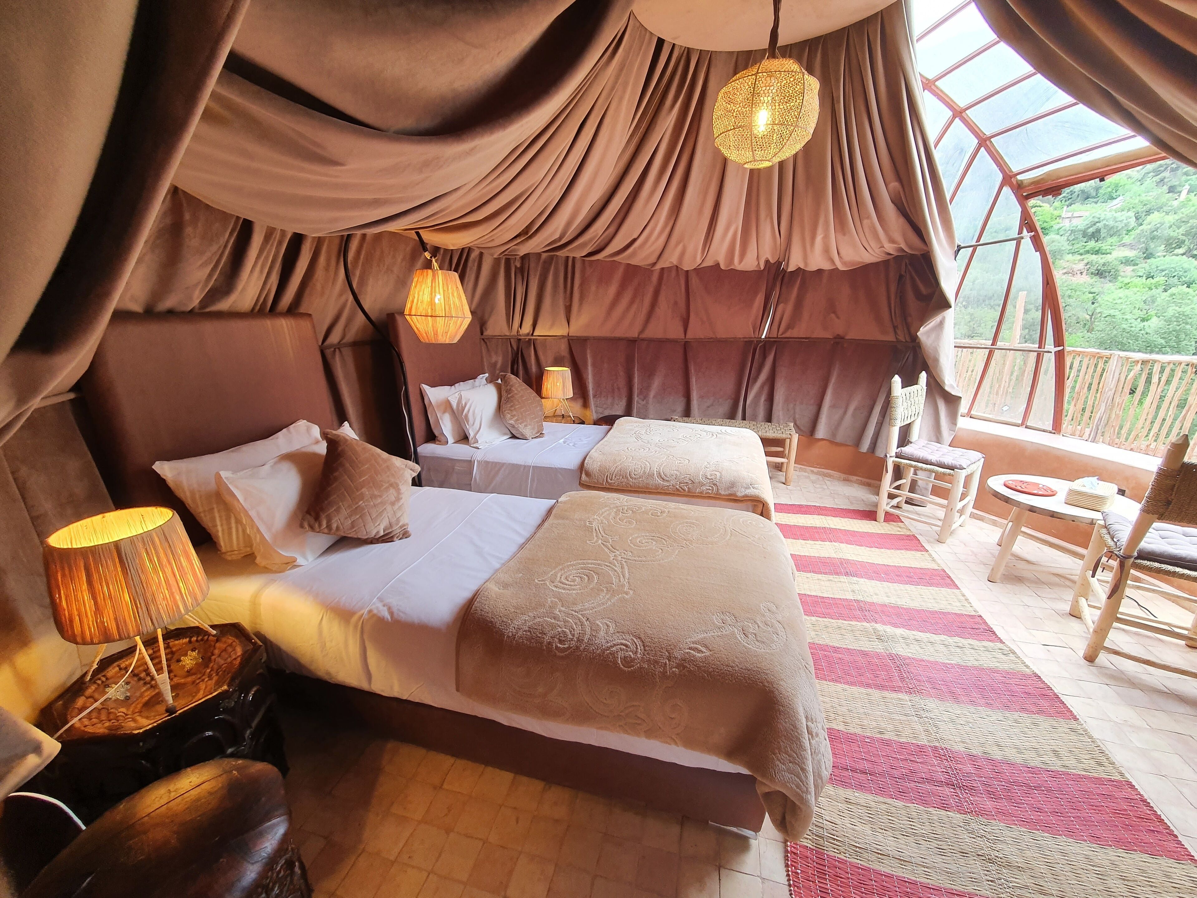 Design Tent | In-room safe, desk, bed sheets