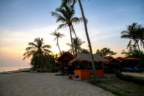On the beach, sun loungers, beach volleyball, beach bar