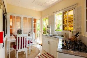 Double Room, Terrace | Private kitchen | Fridge, stovetop, coffee/tea maker, toaster - Oceane Self Catering (La Digue)