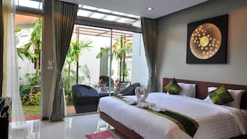 Two-Bedroom Suite | Minibar, in-room safe, desk, rollaway beds