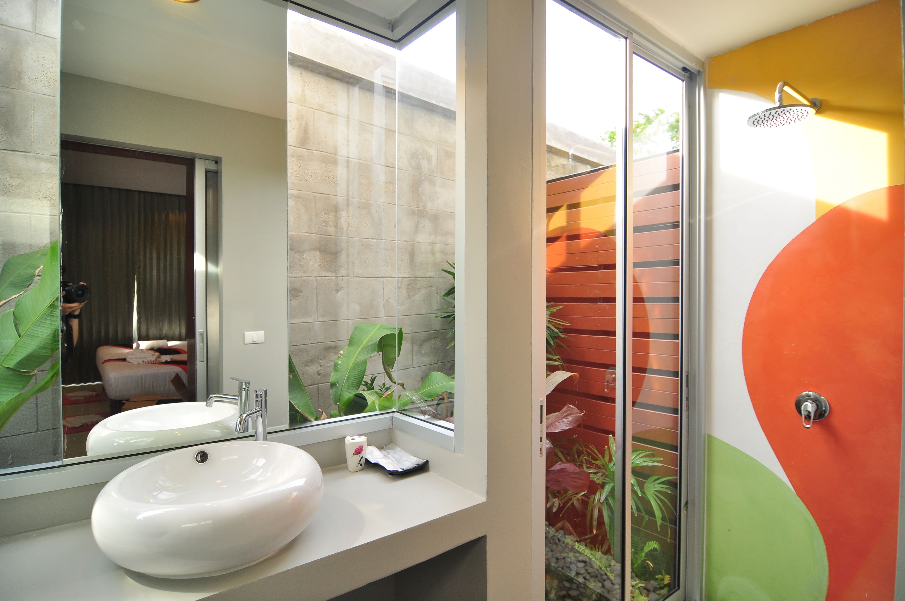 deluxe pool view | bathroom | rainfall showerhead, free toiletries, hair dryer, slippers