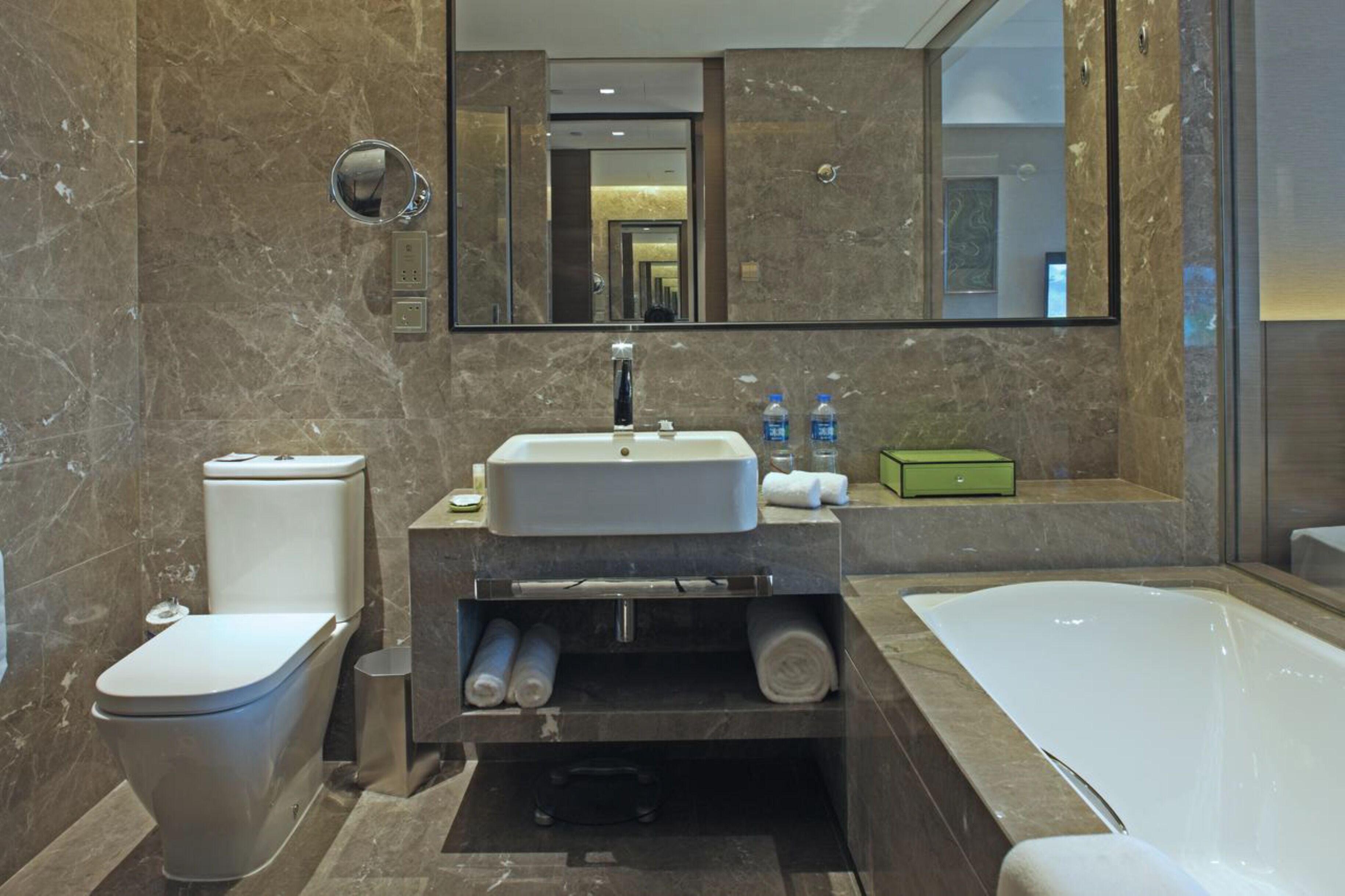 designer toiletries, hair dryer, bathrobes, slippers