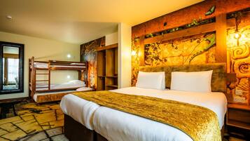 Azteca Accessible themed family room | In-room safe, desk, laptop workspace, iron/ironing board