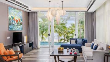 Villa, 4 habitaciones, alberca privada, frente al mar | 1 habitación, minibar, caja de seguridad en la habitación y escritorio