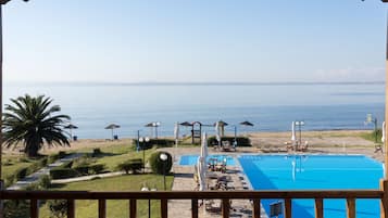 Outdoor pool, pool umbrellas, pool loungers