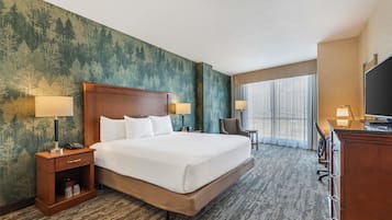 Desk, laptop workspace, blackout drapes, iron/ironing board