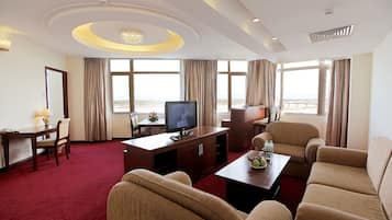 Executive Suite | Living area | Flat-screen TV